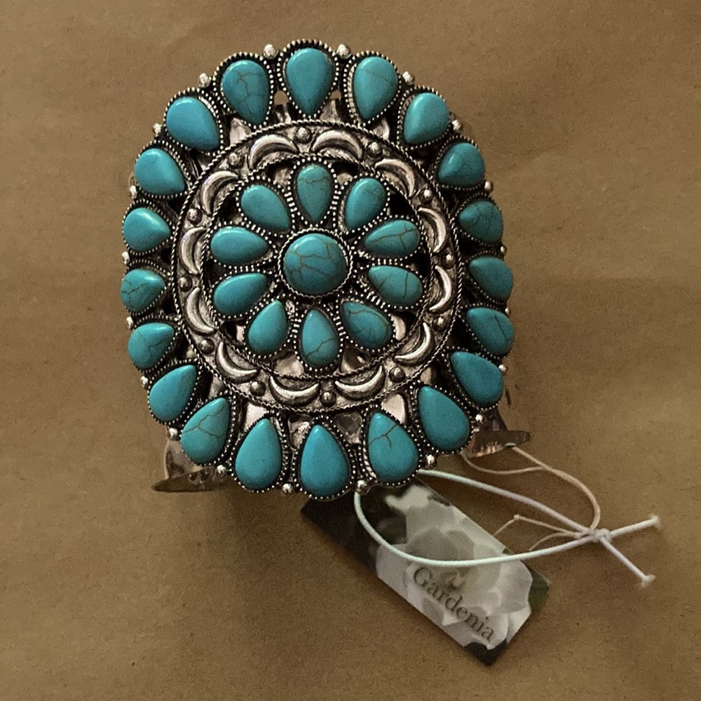 New silver & turquoise bracelet. Orig $19.99. Width of band approx 2 in